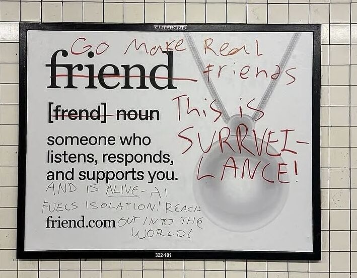 Subway advertisement for Friend.com, vandalized with handwritten messages against AI companionship.